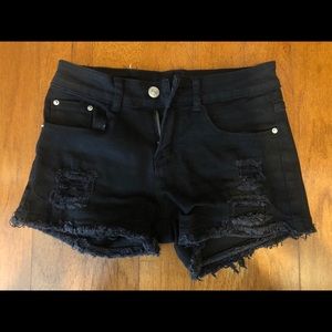Distressed black shorts